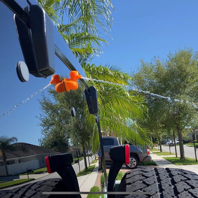 🚗💦 Meet the Ultimate Jeep Accessory: The Fun Middle Finger Spraying Duck! 🦆💥