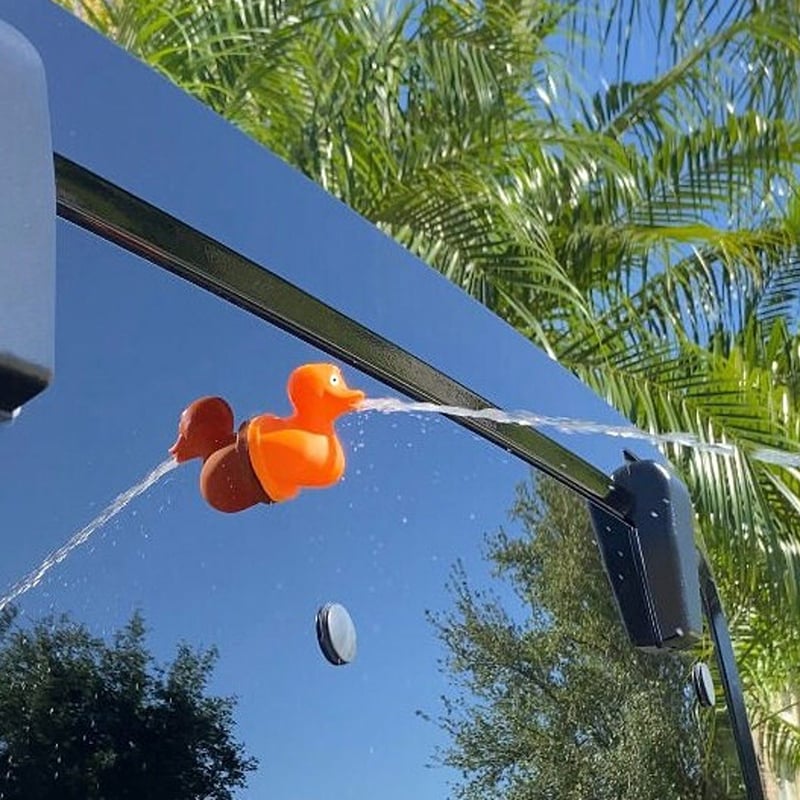 🚗💦 Meet the Ultimate Jeep Accessory: The Fun Middle Finger Spraying Duck! 🦆💥